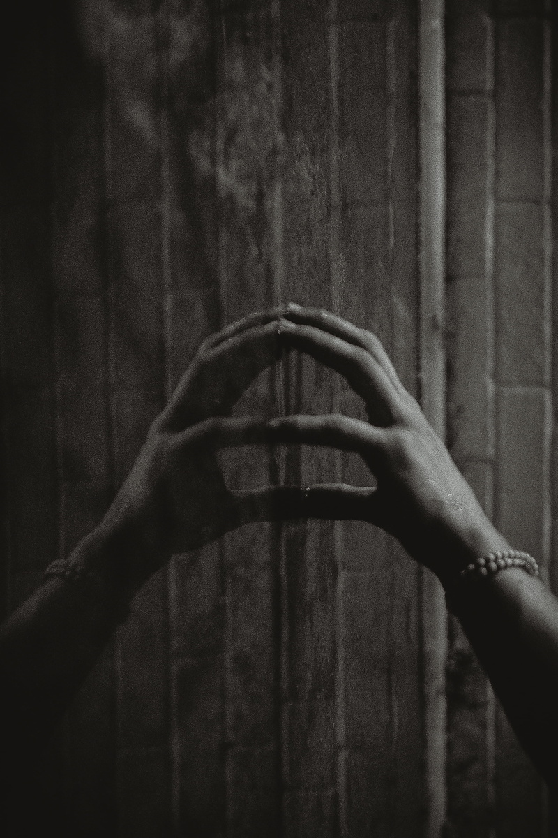 personal perspective, finger, body part, reflection, dark, scary, focus on foreground, one person, close-up, outdoors, halloween, day, spooky, hand, unrecognizable person