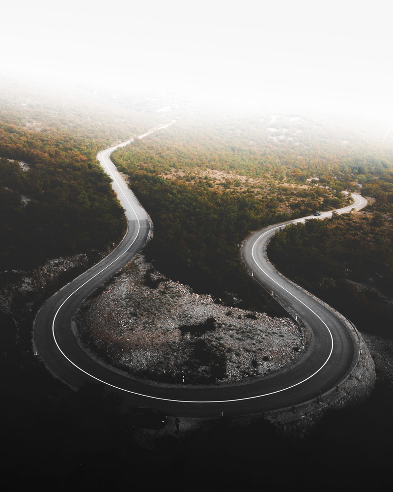 sky, traffic, outdoor, journey, road trip, mountain, dividing Line, highway, multiple Lane Highway, transportation, car, woodland, winding Road, aerial