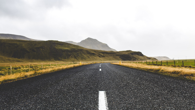 travel Locations, vanishing Point, surface level, environment, non-Urban Scene, sky, journey, travel, straight, symbol, day, dividing Line, mountain, gray