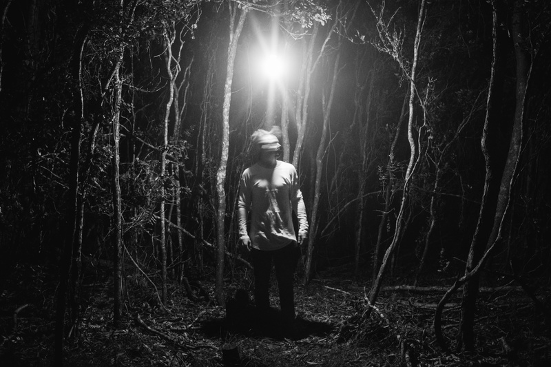 woodland, hunted, bandw, one person, black and white, full length, land, non-urban scene, light, long exposure, night, grayscale, forest, dark, casual clothing