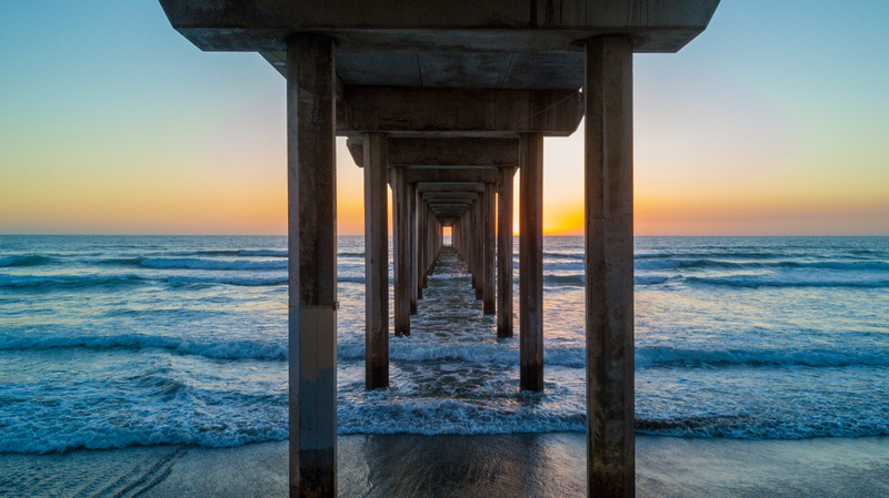 san diego, la jolla, outdoors, tranquility, architectural column, motion, beauty in nature, horizon, united states, sunset, wave, scripps pier, architecture