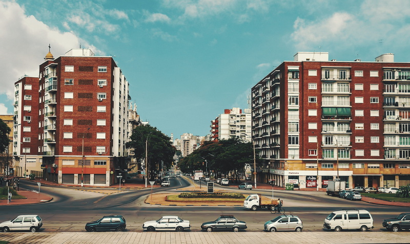 land vehicle, outdoors, building exterior, latina, motor vehicle, road, sky, street, sign, building, montevideo, no people, residential district, built structure