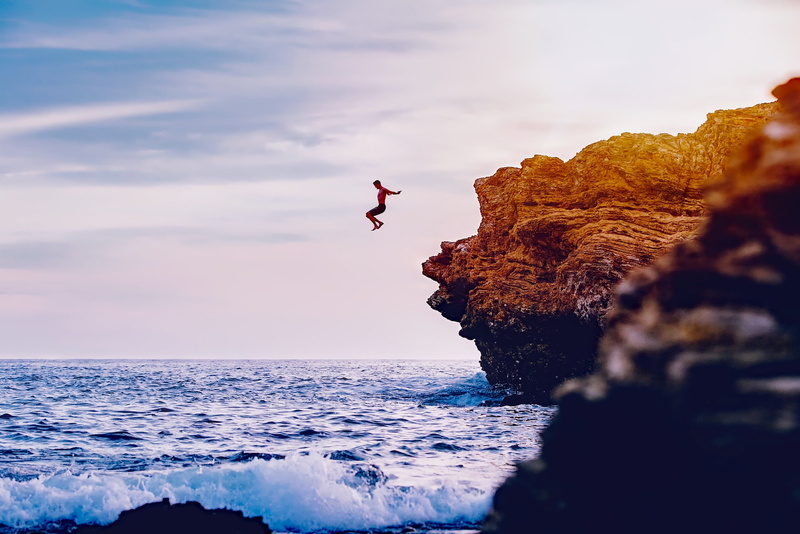 person, 1080P, hdr, beauty in nature, horizon, water, rock, seashore, seaside, clouds, rock - object, mid-air, sport, sea, sky, waves, leisure activity