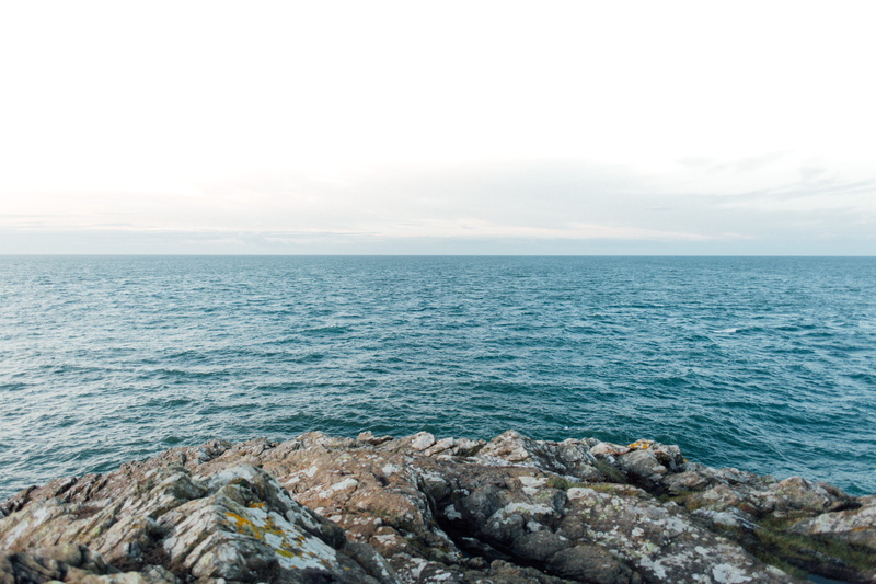 tranquil scene, cloud - sky, wales, horizon, nature, beauty in nature, travel, sky, rocky coastline, idyllic, beach, united kingdom, rocks, non-urban scene