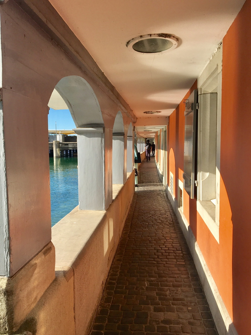 men, day, swiss, arcade, tourism, footpath, river, zurich, window, road, hike, architectural column, walking, door, architecture, places of interest, lindenhof