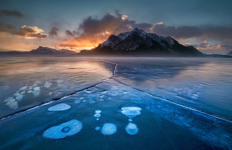 720P, clouds, environment, bubbles, reflection, sunset, sea, lagoon, Alberta, cloud - sky, sunlight, tranquility, tranquil scene, beauty in nature, mountain