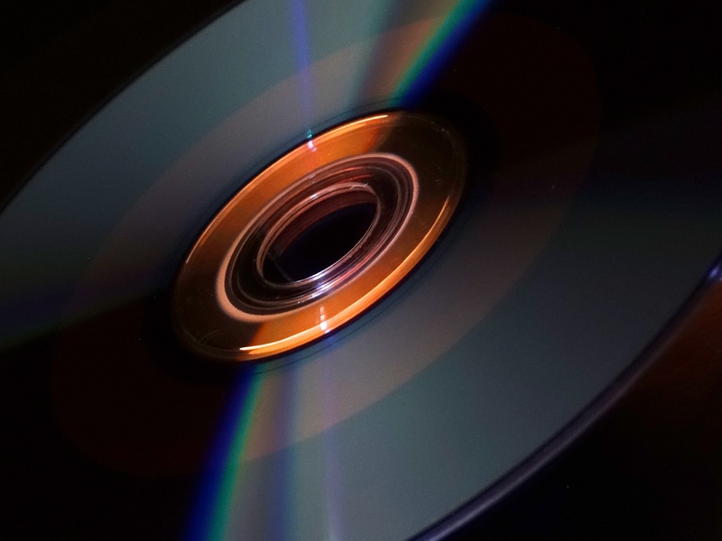 data, center, refraction, paper, demarcation, disk, multi colored, black, reflection, orange, cd, geometric shape, music, digital, pattern, shape, dvd