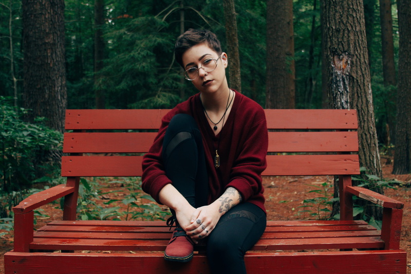 wearing, sweater, jeans, one person, trendy, forest, wood, red, lifestyles, park bench, woodland, young men, bench, young adult, black, near, female, fores