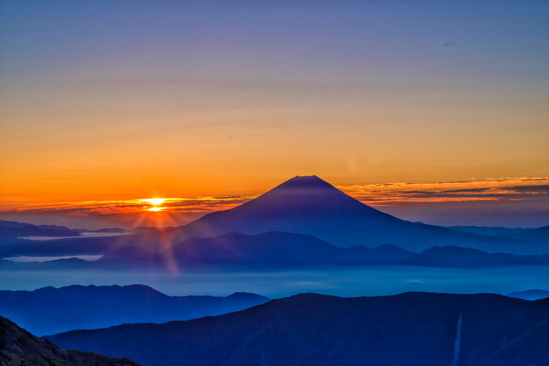 morning haze, sunset, tranquil scene, mountain peak, non-urban scene, mt fuji, sky, japan, idyllic, outdoors, orange color, mountain, scenics, environment