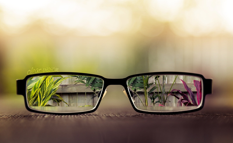 black, focus on foreground, personal accessory, transparent, no people, Macro, Clear, eyewear, still life, indoors, fashion, close-up, eyeglasses, selective focus