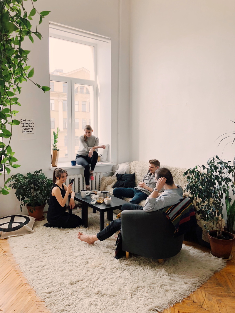 domestic room, apartment, men, carpet, mother, sit, friends, plants, sitting, child, real people, sister, women, inside, daughter, furniture, childhood