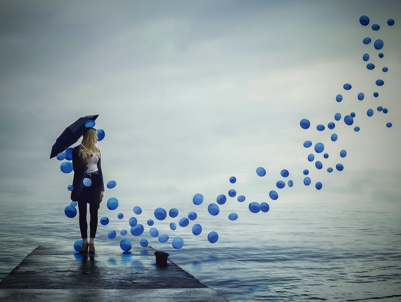 one person, balloon, outdoors, lifestyles, cloud - sky, protection, clouds, water, waterfront, men, umbrella, model, women, standing, sea, sky, dock, black
