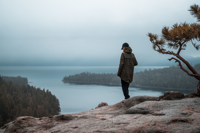 nearby, rock - object, water, one person, 4K, young men, edge, landscape, view from the top, emerald bay, real people, mist, outdoors, male, rain coat