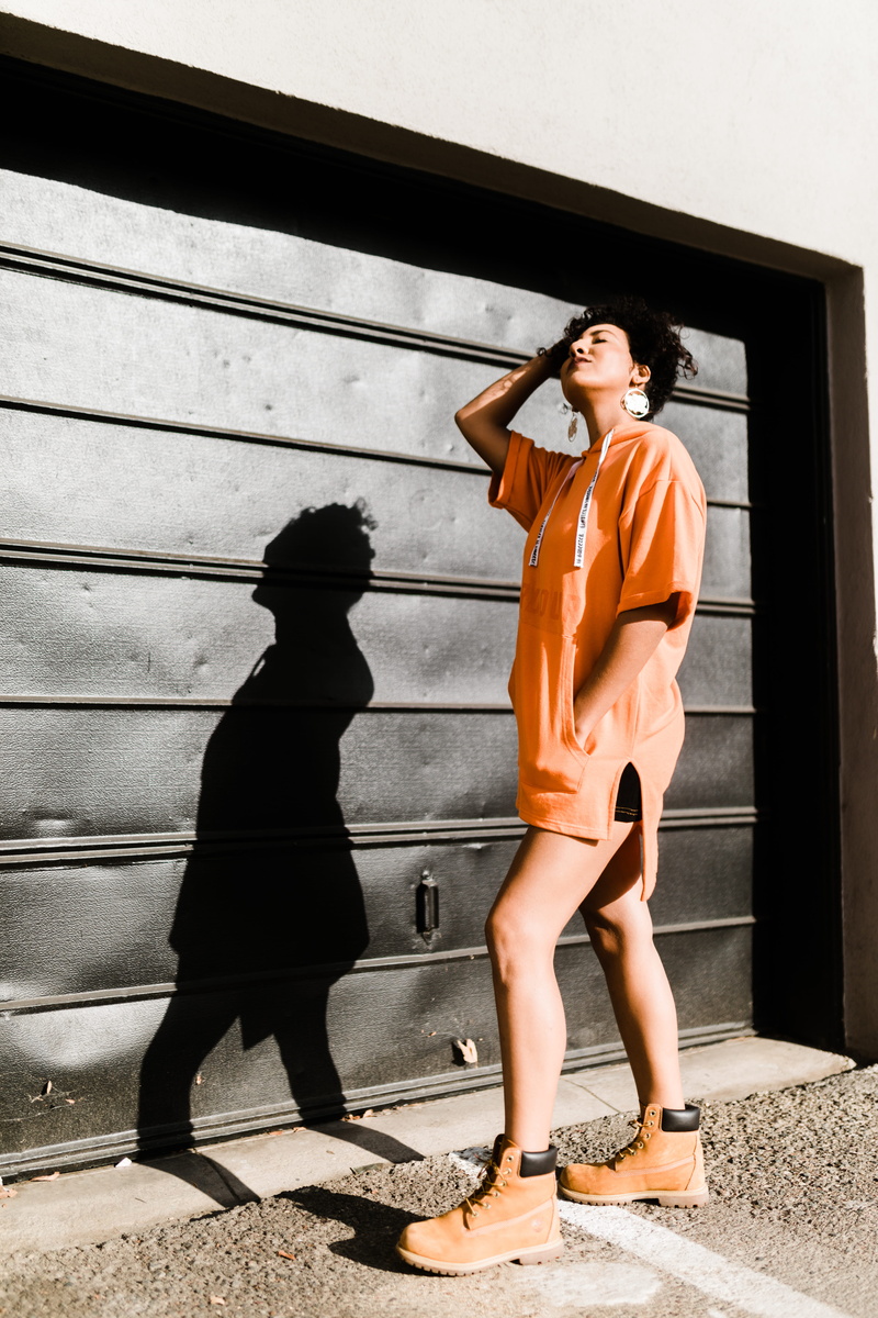 architecture, downtown, outdoors, sunlight, shadow silhouette, shadow, young women, roller, casual clothing, real people, full length, portrait, nearby