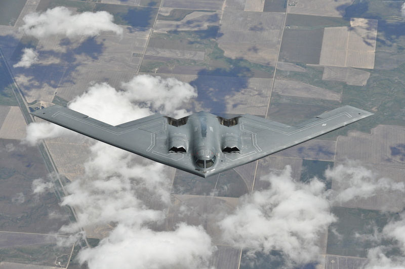 no people, bomber, fighter plane, transportation, day, plane, jet engine, U.S. Air Force, mid-air, airplane, smoke - physical structure, engine, motion