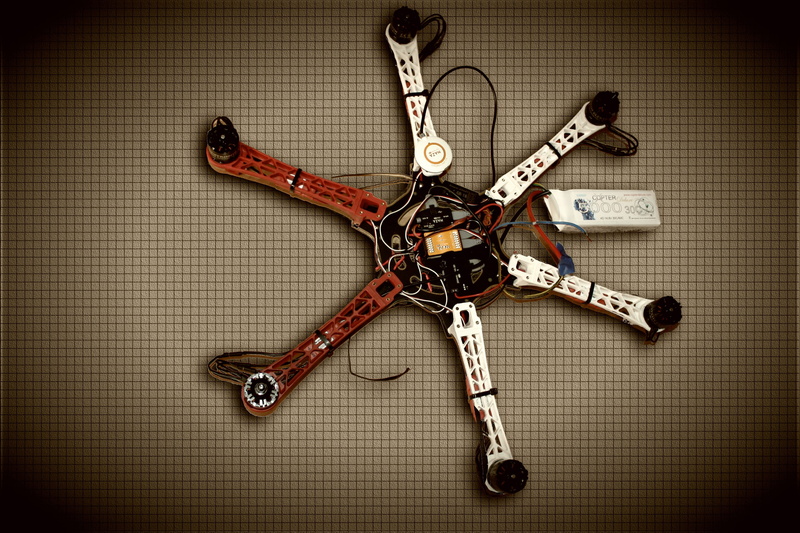 pattern, male likeness, creativity, copter, no people, multicopter, hexacopter, toy, flooring, metal, drone, high angle view, close-up, technology, text
