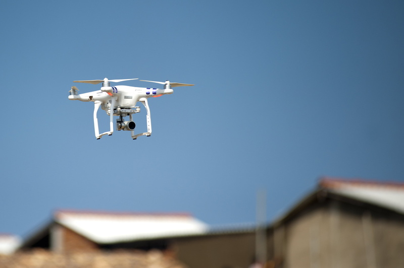 plane, flight, digital photography, mid-air, building exterior, people, government, family, robot, hobby, transportation, military, low angle view, mode of transportation