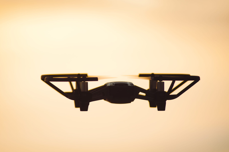 bright, small, technology, arts culture and entertainment, quadcopter, sky, indoors, single object, full length, drone, silhouette, tello, colored background