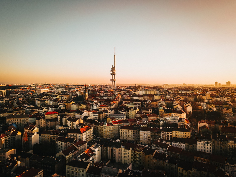 sky, neighborhood, building exterior, community, steeple, aerial view, urban, crowded, clear sky, built structure, prague - zizkov, scenery, drone, town