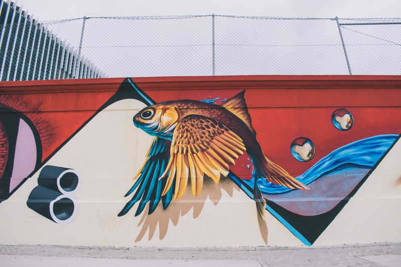 low angle shot, design, beautiful, architecture, craft, representation, wall, bird, art, symbol, wings, built structure, building exterior, one animal