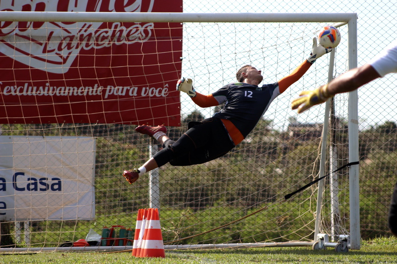 human limb, goalkeeper, day, body part, 5K, sport, motion, one person, limb, arms raised, arms outstretched, playing, full length, skill, real people