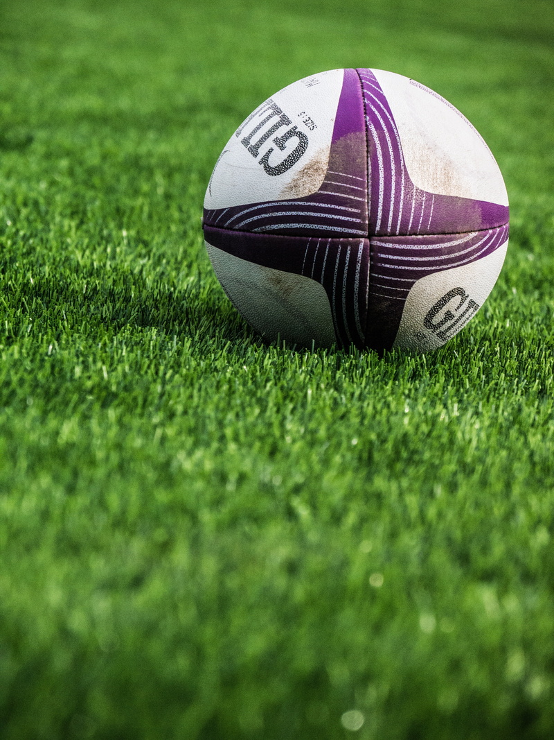 ball, close-up, focus, 4K, white, green color, rugby, day, no people, sports equipment, selective focus, focus on foreground, outdoors, shoe, shallow