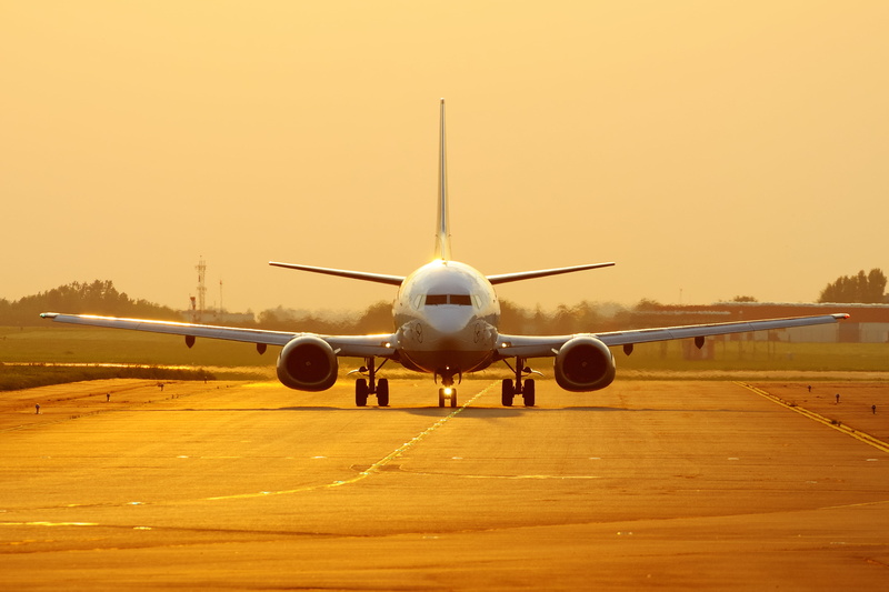 sky, clear sky, runway, landing - touching down, nature, white, outdoors, airport runway, air vehicle, commercial airplane, dusk, mode of transportation