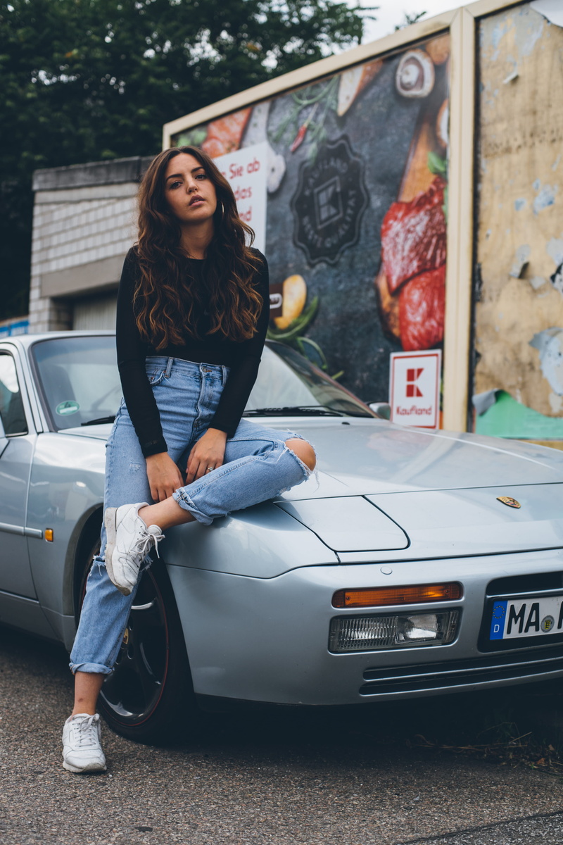 urban Scene, standing, porsche, female, smiling, portrait, one Person, lifestyles, beauty, young Women, cheerful, service, females, caucasian Ethnicity