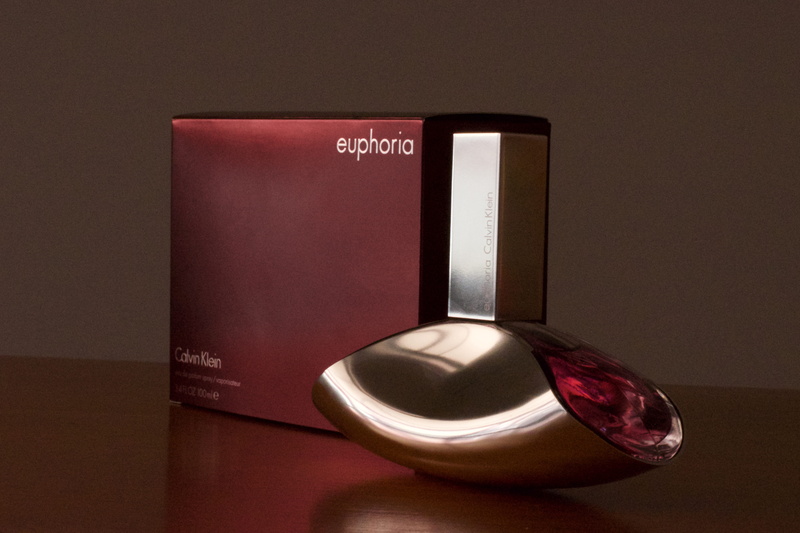 face makeup, bathroom, perfume, western script, indoors, accessories, red, modern, cosmetics, group, text, equipment, mouse, still life, single object