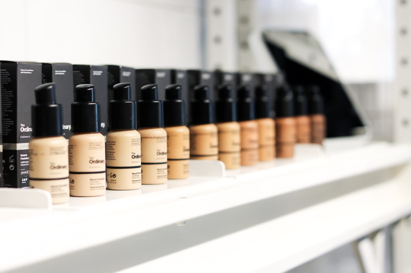 consumerism, united states of america, cosmetics, retail, the ordinary, face makeup, selective focus, sunscreen, spray, close-up, choice, lipstick, label