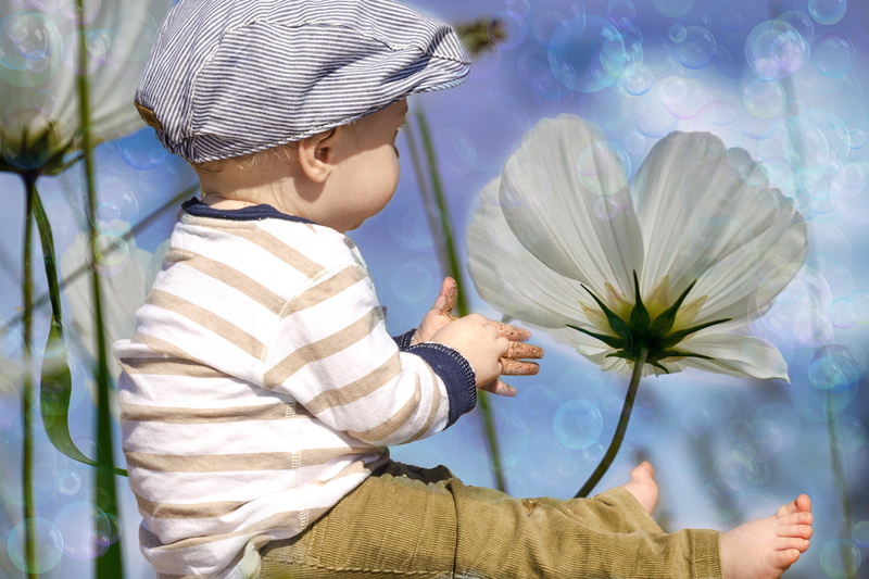 lifestyles, barefoot, flowering plant, mood, innocence, feet, flower, beauty in nature, freshness, legs, 5K, sitting, cap, child, image editing, flower head