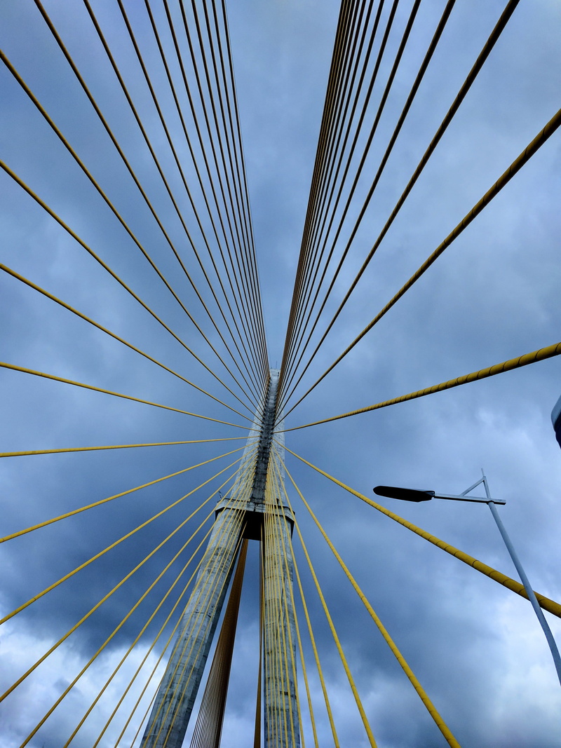 built structure, suspension bridge, blue, manaus, elevation, bridge - man made structure, cable, day, cloud - sky, no people, transportation, sky, tall - high
