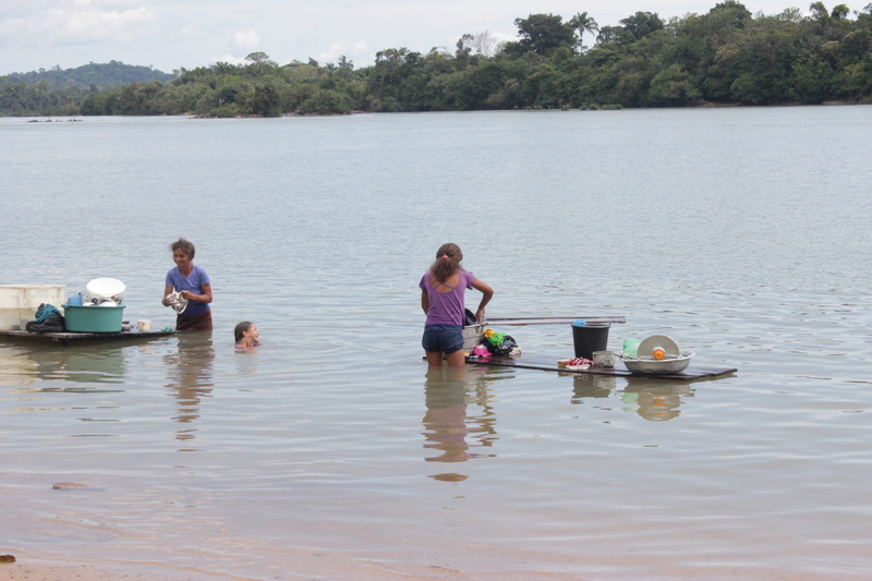 group of people, girls, lifestyles, river, people, sitting, child, waterfront, men, para, nature, amazonas, women, outdoors, water, childhood, leisure activity