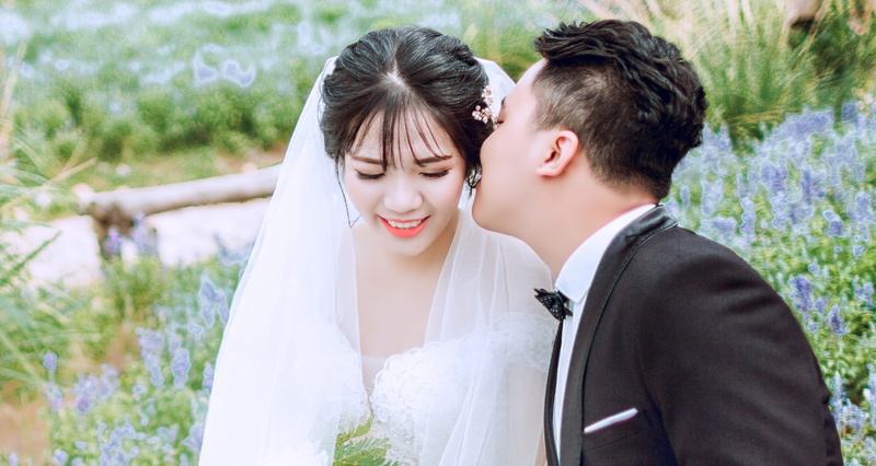kissing, woman, couple - relationship, together, adult, women, photoshoot, newlywed, positive emotion, wedding ceremony, men, affection, close-up, wedding dress