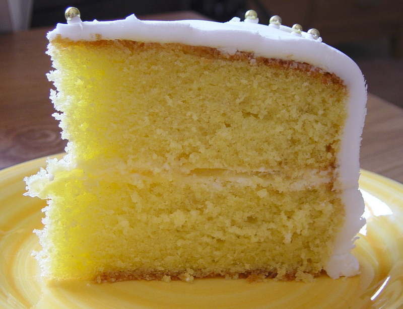 slice, food and drink, focus on foreground, temptation, yellow, table, indulgence, food, no people, sweet, baked, ready-to-eat, dessert, still life, freshness