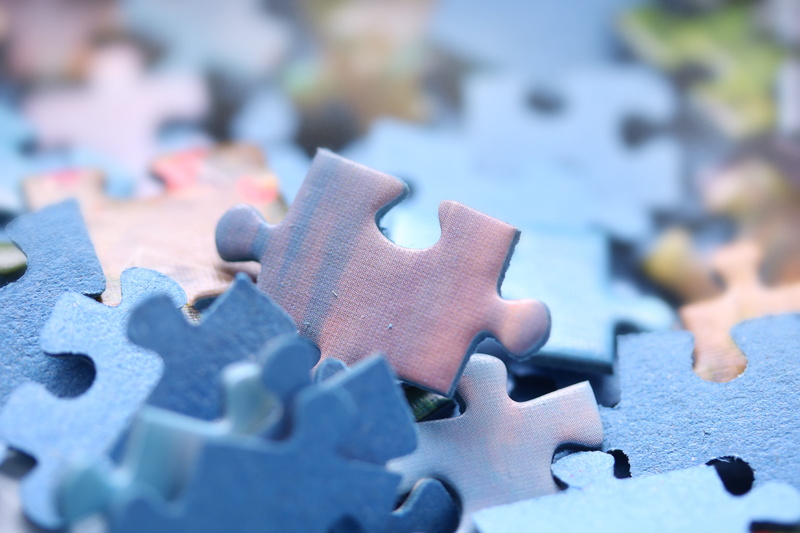 jigsaw piece, indoors, large group of objects, no people, jigsaw puzzle, folding, incomplete, pieces, puzzle, leisure games, interlocked, close-up, pattern