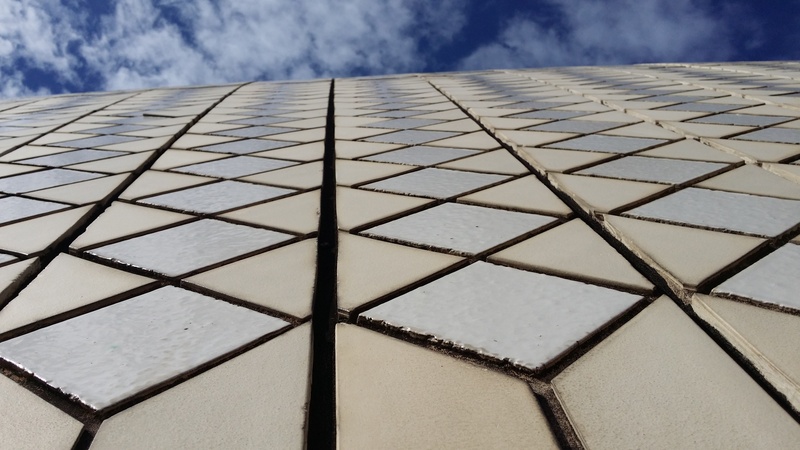 building exterior, no people, texture, nature, tiles, outdoors, interlocking, shape, geometric, cloud - sky, sunlight, interlock, modern, close-up, glass - material