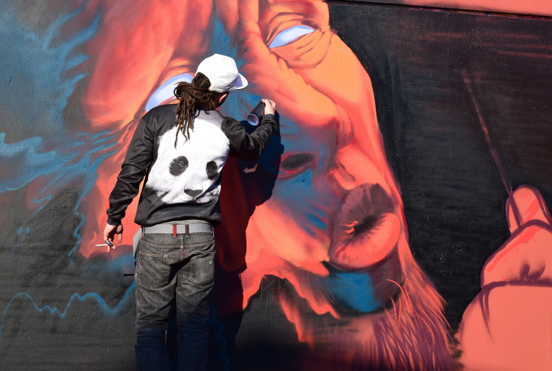 drawing, real people, wall, outdoors, artist, mural, graffiti, rear view, art and craft, spray, creativity, people, three quarter length, lifestyles, 5K