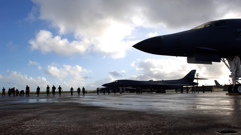 incidental people, transportation, travel, outdoors, beach, cloud - sky, jets, military aircraft, sky, 1080P, land, jet, building exterior, day, water