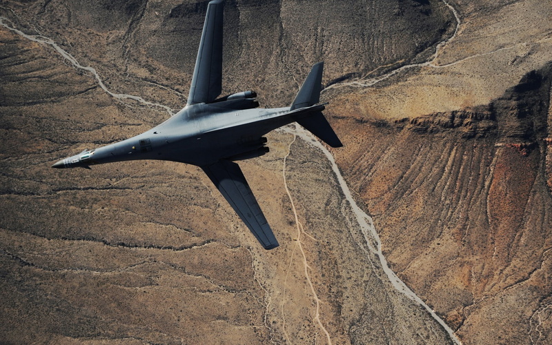 low angle view, army, outdoors, air vehicle, nature, plane, transportation, aerospace industry, mid-air, rock formation, Rockwell B-1 Lancer, 1080P, mountain