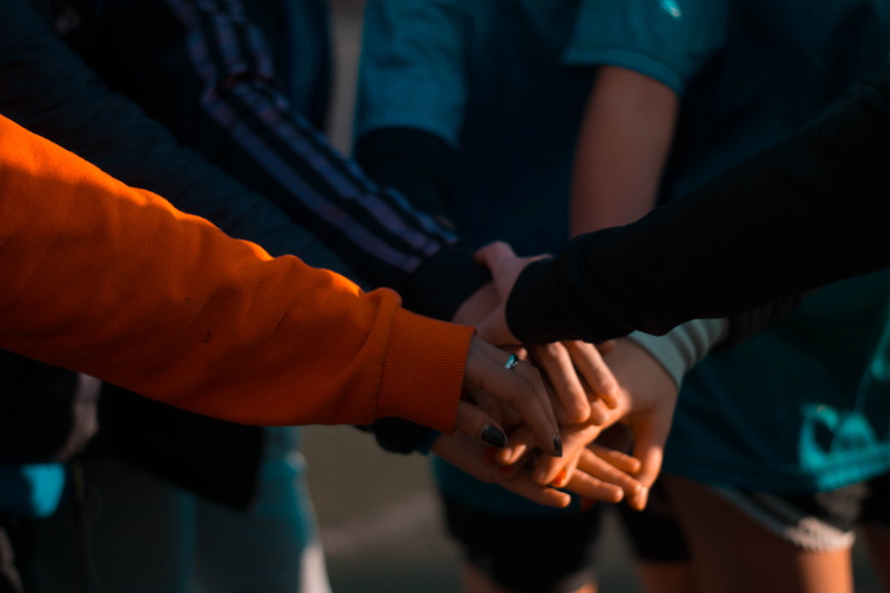 group, human hand, orange color, adult, bonding, 5K, teamwork, lifestyles, finger, holding, close-up, men, real people, holding hands, human body part