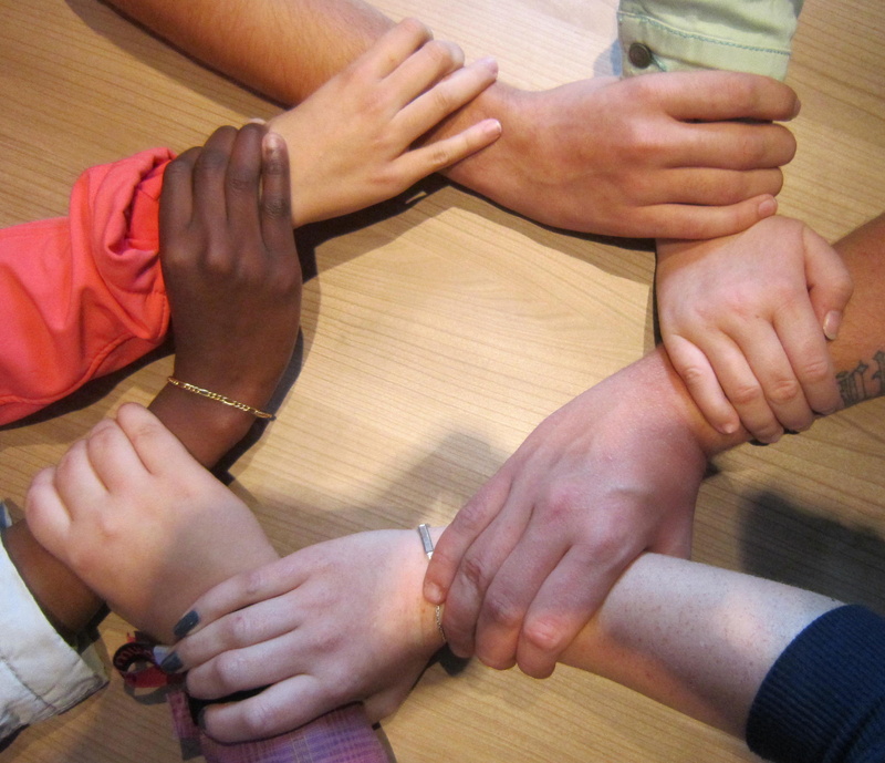 sitting, 2K, team, hand, body part, adult, bonding, men, human hand, indoors, flooring, positive emotion, human body part, friendship, high angle view