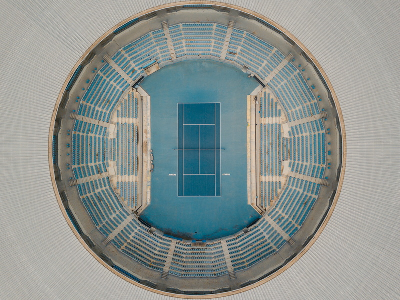 building, glass - material, white, building exterior, closed, drone, view, city, 2K, day, window, blue, eye, sky, digital composite, athletic, symmetry