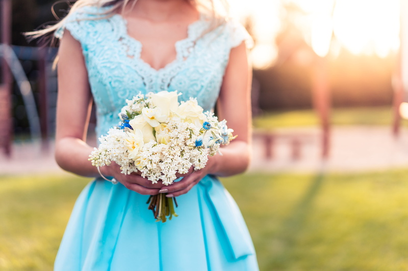 flower, midsection, happy, flowering plant, bouquet, blue, fashion, beauty, smiling, dress, focus on foreground, plant, outdoors, sunny, bride, bridesmaid