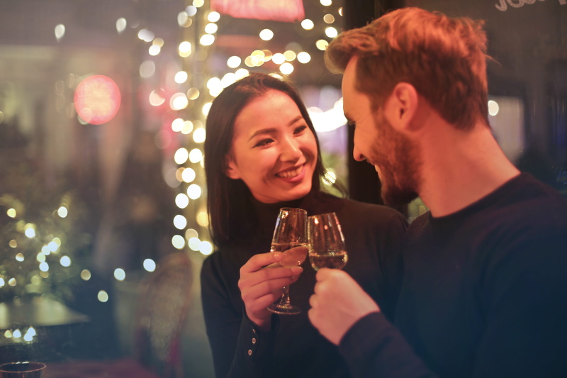smiling, eyes to eyes, drinking, laugh, black hair, glasses, date, couple - relationship, atmosphere, restaurant, fun, on a date, proposing, positive emotion