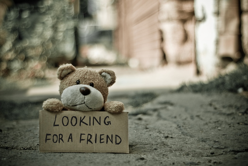 no People, western script, focus on foreground, animal representation, inscription, brown, outdoors, art and craft, craft, gift, teddy Bear, mammal, message