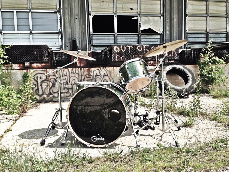 drummer, deterioration, built structure, circle, party, musical, obsolete, run-down, day, sound, garage, drum, instrument, gray, play, building, band, mode of transportation