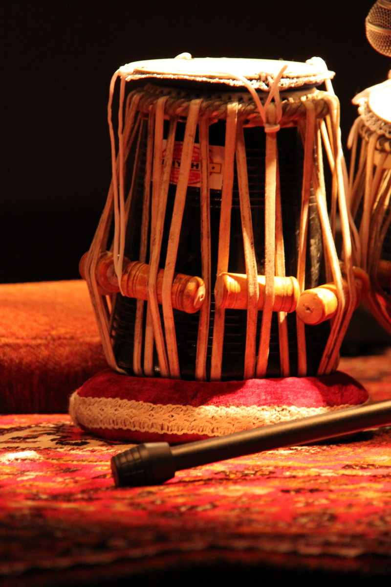 electric lamp, tabla, communication, musical, black, fire, studio shot, single object, flame, 4K, drum, table, black background, instrument, drink, percussion
