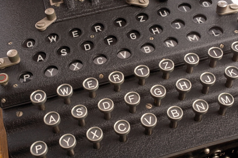 typewriter, full frame, vehicle part, metal, indoors, bolt, circle, type, shape, black color, equipment, secret, enigma, industry, antique, wheel, backgrounds