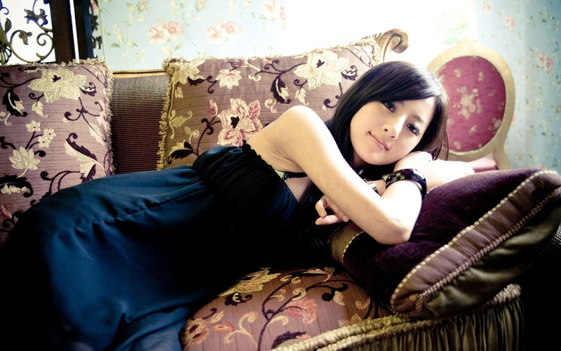 furniture, women, real people, Asian, indoors, full length, young women, home interior, sitting, sofa, beautiful woman, Mikako Zhang, hairstyle, pillow